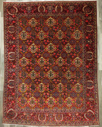 Antique Persian Bakhtiar Rug Circa 1930 | 10' 1" X 13' 6" | Garden-Panel Design | Red & Ivory Colours With Gold Accents | Tribal Production